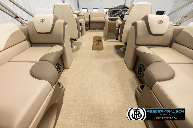 Slide: The Image of Luxurious interior of 2024 Tahoe 2185 LTZ QL pontoon boat with beige seating. - 17