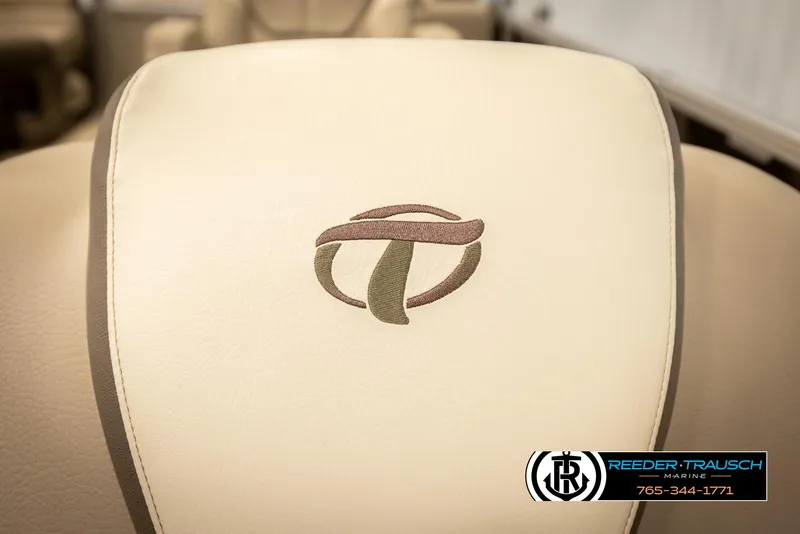 Slide: The Image of 2024 Tahoe 2185 LTZ QL seat with embroidered logo, beige upholstery. - 26