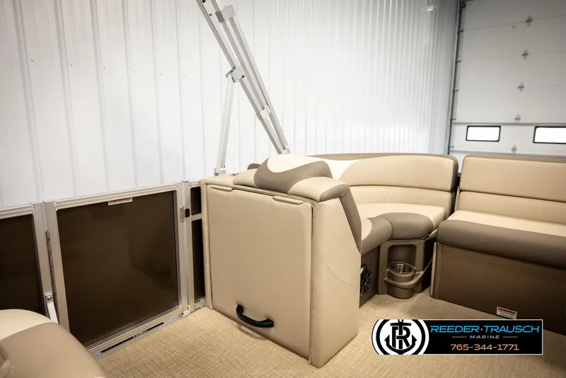 Slide: The Image of 2024 Tahoe 2185 LTZ QL pontoon boat interior with beige seating and carpet. - 31