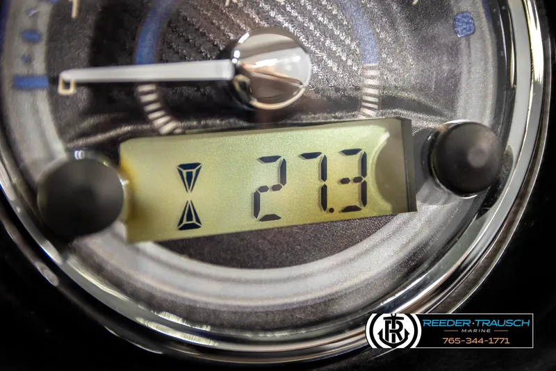 Slide: The Image of Close-up of a 2024 Tahoe 2185 LTZ QL gauge displaying 27.3. - 39