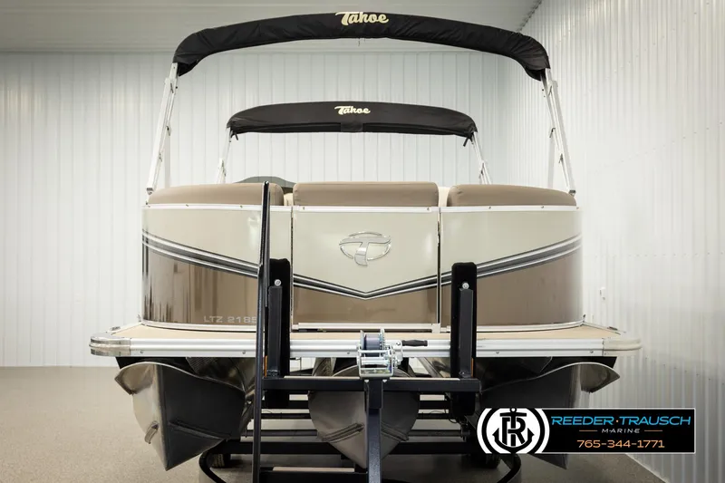 Slide: The Image of 2024 Tahoe 2185 LTZ QL pontoon boat in showroom, rear view. - 8