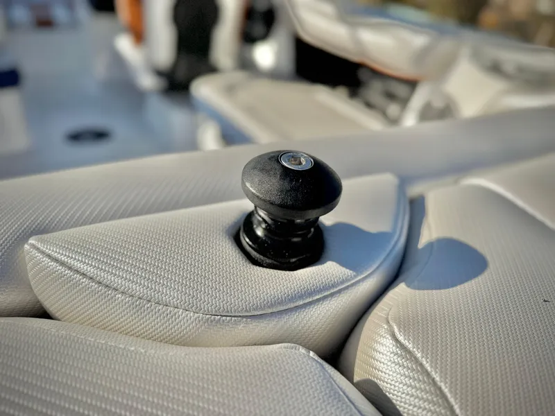 Slide: The Image of Close-up of a 2021 Axis T22 boat interior detail with textured upholstery. - 10