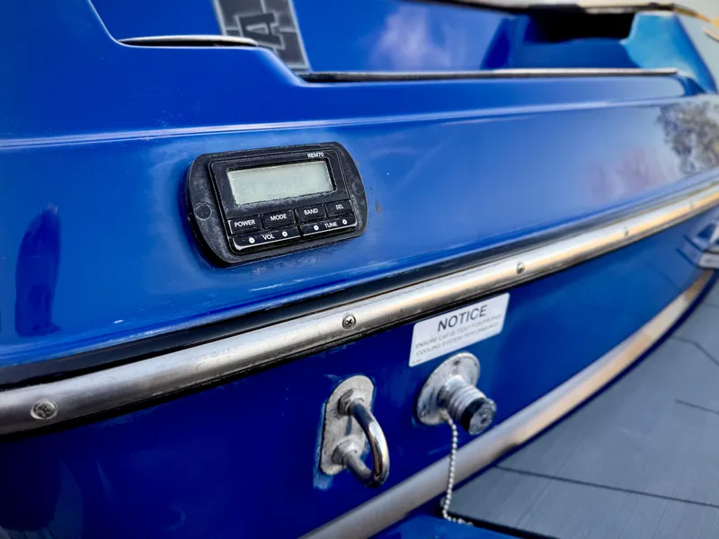 Slide: The Image of Blue 2021 Axis T22 boat dashboard with control panel and notice label. - 9