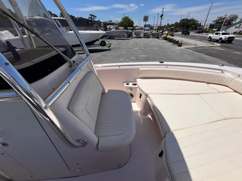 Slide: The Image of 2013 Grady-White Fisherman 257 boat interior with seating and deck view. - 18