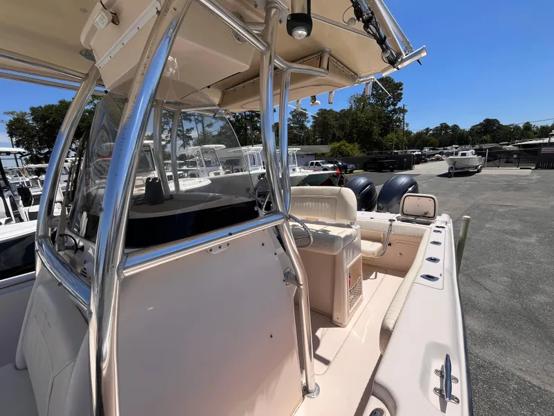 Slide: The Image of 2013 Grady-White Fisherman 257 boat with center console and dual engines. - 20