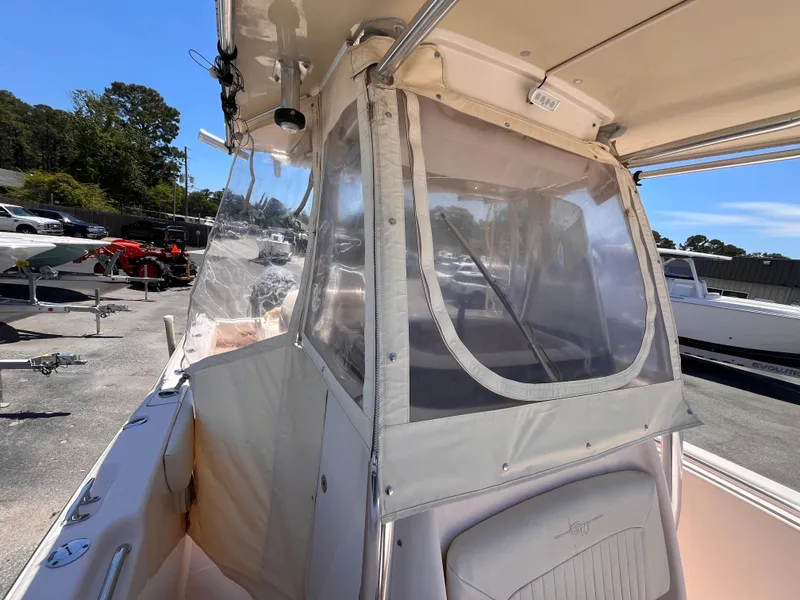 Slide: The Image of 2013 Grady-White Fisherman 257 boat with enclosed helm, parked outdoors. - 30