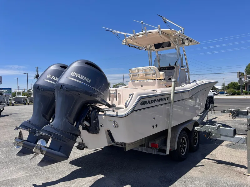 Slide: The Image of 2013 Grady-White Fisherman 257 boat with dual Yamaha engines on a trailer. - 4