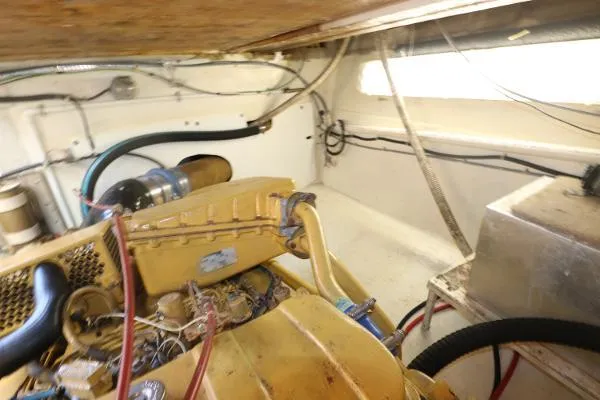 Slide: The Image of Engine room of a 1991 Atlantic 38 Super Sport boat, showcasing mechanical components. - 27