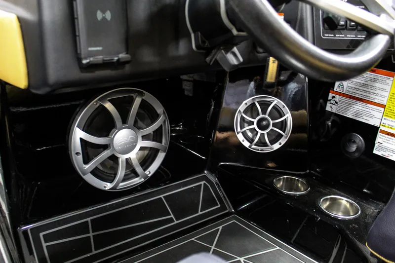 Slide: The Image of 2021 ATX Surf Boats 22 Type-S interior with speakers and cup holders. - 14