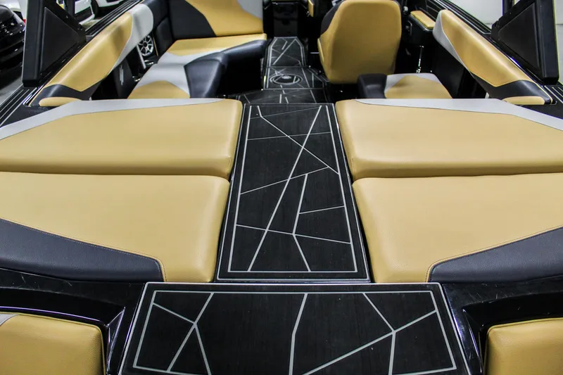 Slide: The Image of 2021 ATX Surf Boats 22 Type-S interior with modern seating and geometric design. - 30