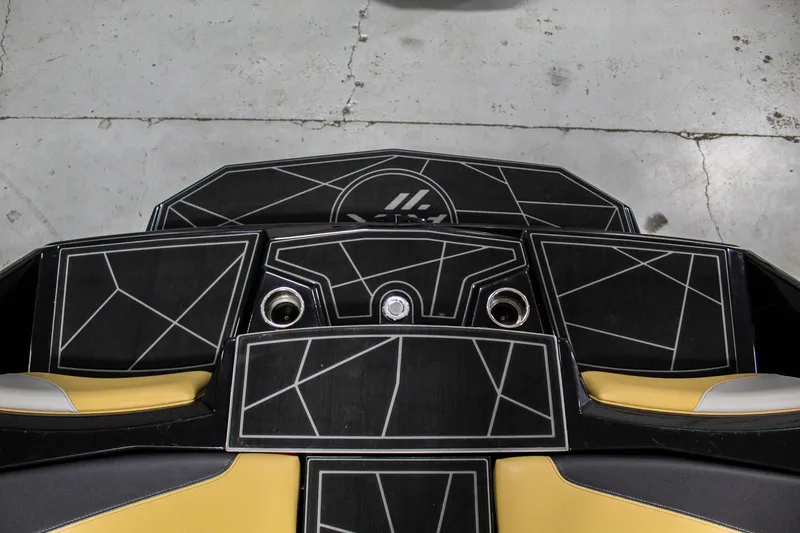 Slide: The Image of 2021 ATX Surf Boats 22 Type-S deck with geometric design and cup holders. - 33