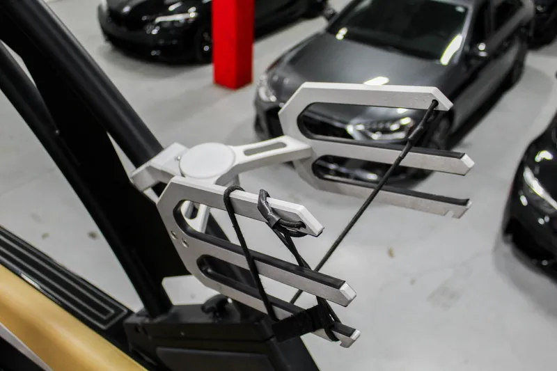 Slide: The Image of Wakeboard rack on 2021 ATX Surf Boats 22 Type-S, in a garage setting. - 42