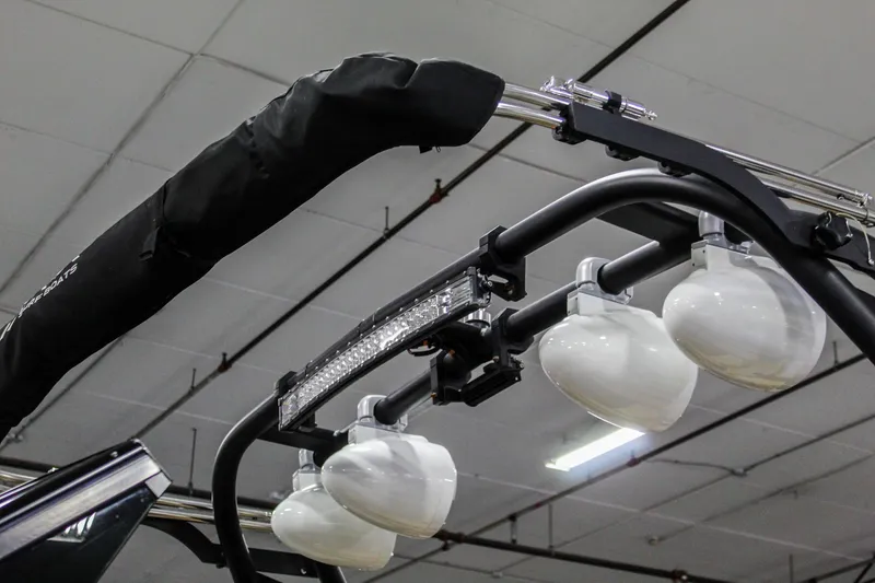 Slide: The Image of 2021 ATX Surf Boats 22 Type-S tower with mounted speakers in a showroom. - 46