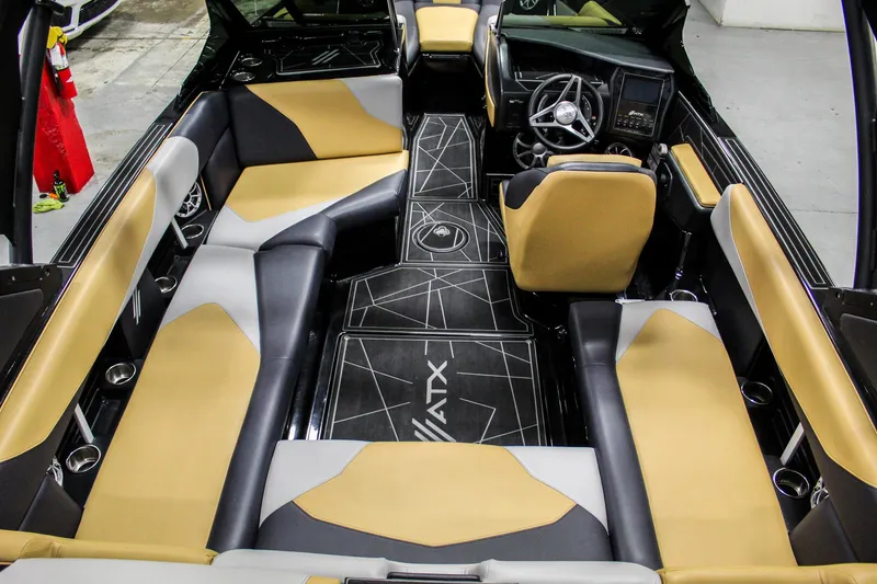 Slide: The Image of 2021 ATX Surf Boats 22 Type-S interior with modern seating and sleek design. - 8