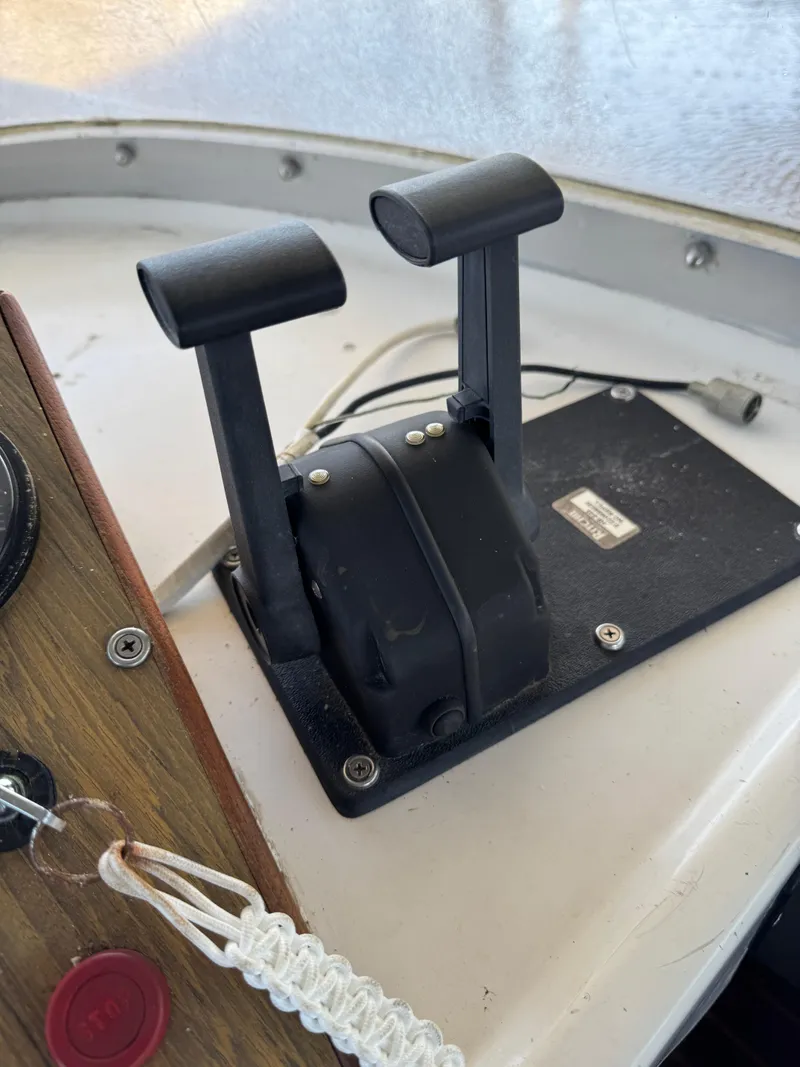 Slide: The Image of Throttle controls on a 1978 Bertram 31 Sportfisher Yanmars boat. - 16
