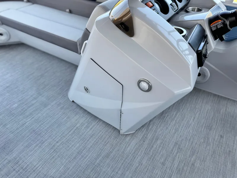 Slide: The Image of 2023 Bennington SX 21 boat interior console with seating and controls. - 26