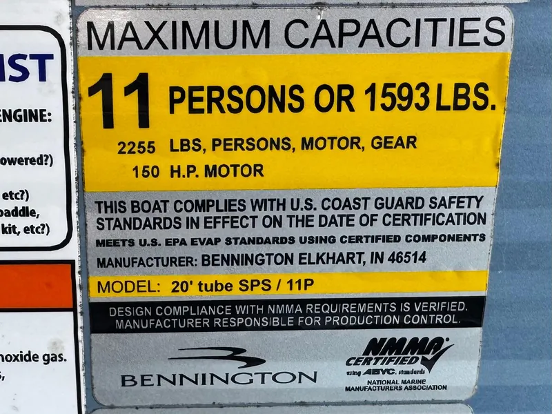 Slide: The Image of Maximum capacity label for 2023 Bennington SX 21 boat, 11 persons or 1593 lbs. - 28