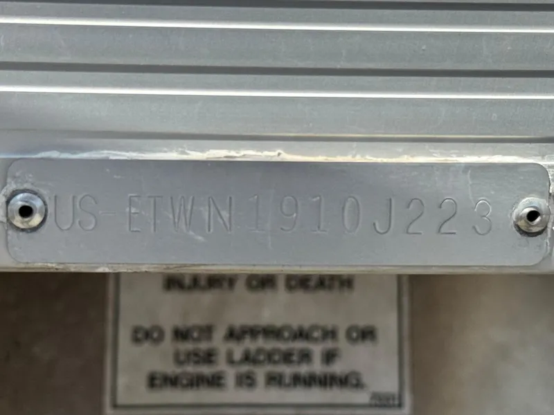 Slide: The Image of 2023 Bennington SX 21 boat identification plate with warning label. - 29