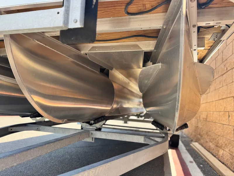 Slide: The Image of 2023 Bennington SX 21 pontoon boat underside, showcasing sleek aluminum pontoons. - 3