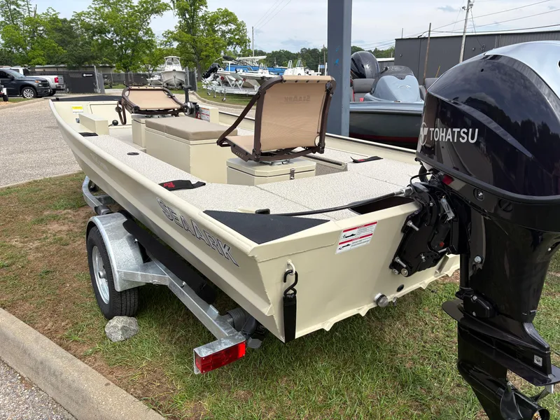 Slide: The Image of 2025 SeaArk 1652 Crappie boat on trailer with Tohatsu outboard motor. - 13