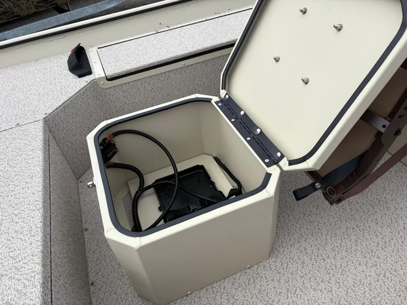 Slide: The Image of Open storage compartment in 2025 SeaArk 1652 Crappie boat, showcasing interior space. - 8