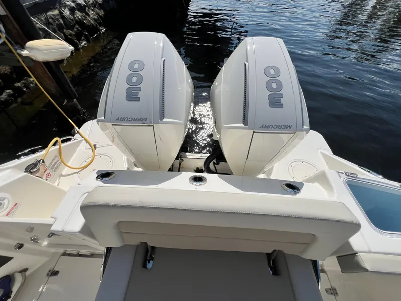 Slide: The Image of 2023 Boston Whaler 280 Vantage with twin Mercury outboard engines on water. - 10