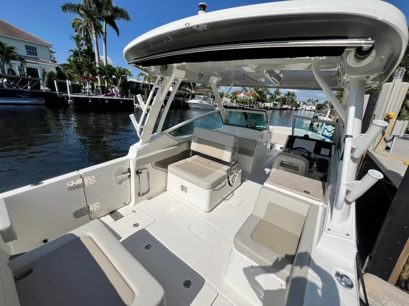 Slide: The Image of 2023 Boston Whaler 280 Vantage boat interior, featuring spacious seating and modern design. - 12