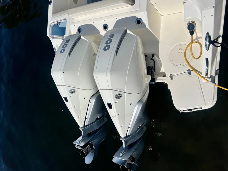 Slide: The Image of Twin outboard engines on a 2023 Boston Whaler 280 Vantage boat. - 8