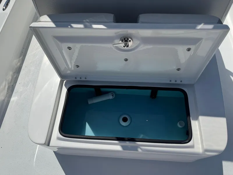 Slide: The Image of Open storage compartment on 2019 Shallow Sport 21 Sport boat. - 20