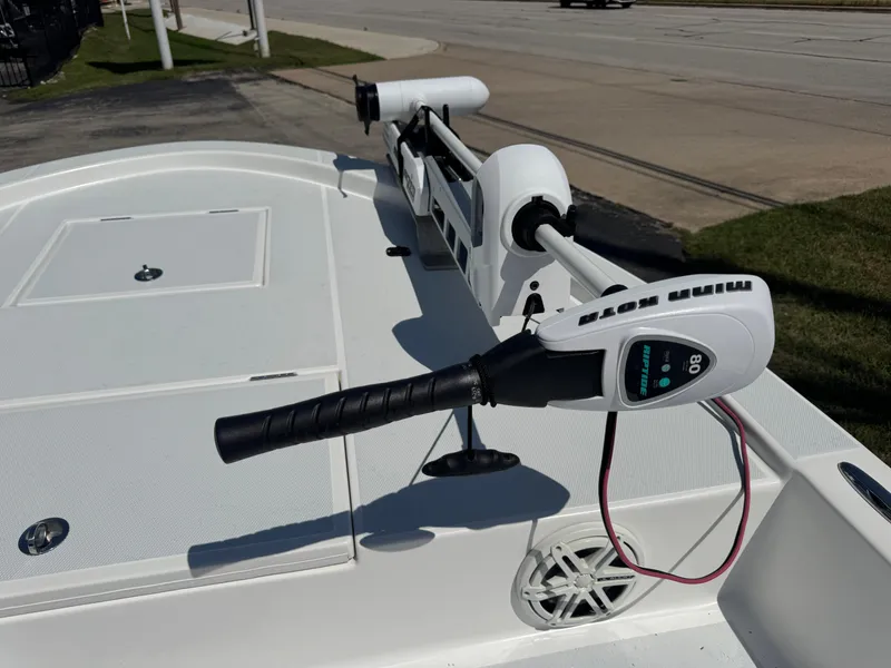 Slide: The Image of 2019 Shallow Sport 21 Sport boat with trolling motor on deck. - 23