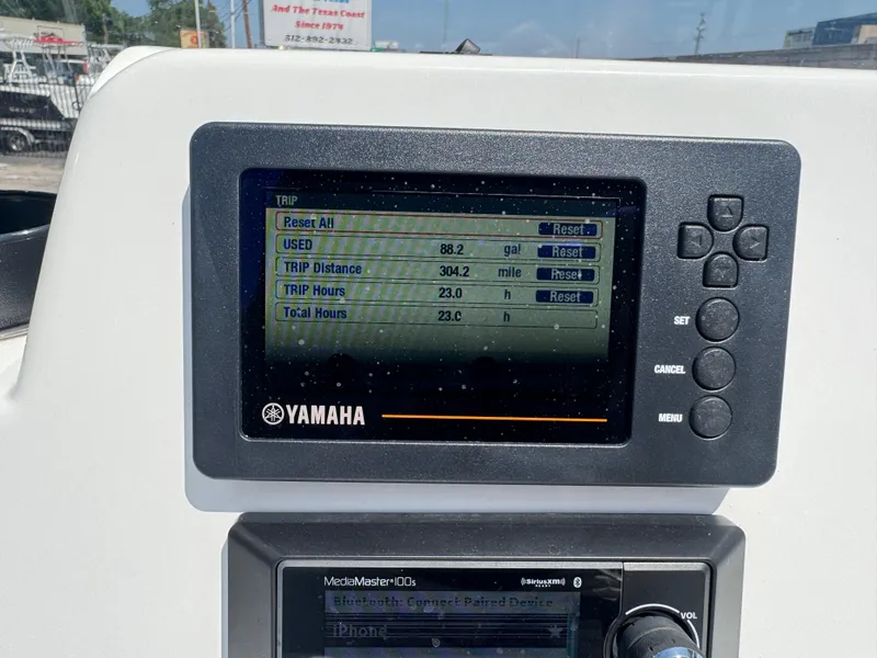 Slide: The Image of Yamaha display on 2019 Shallow Sport 21 Sport showing trip data and fuel usage. - 7