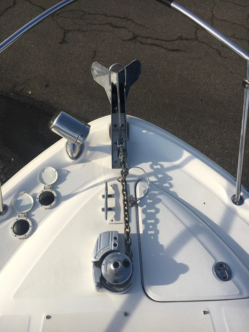 Slide: The Image of Bow of 2004 Sea Ray 340 Sundancer with anchor and chain mechanism. - 25