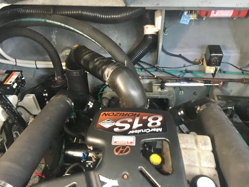 Slide: The Image of Engine compartment of a 2004 Sea Ray 340 Sundancer with MerCruiser 8.1S Horizon engine. - 29
