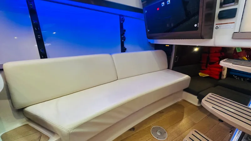 Slide: The Image of Interior of 2018 Boston Whaler 345 Conquest with white seating and modern design. - 18