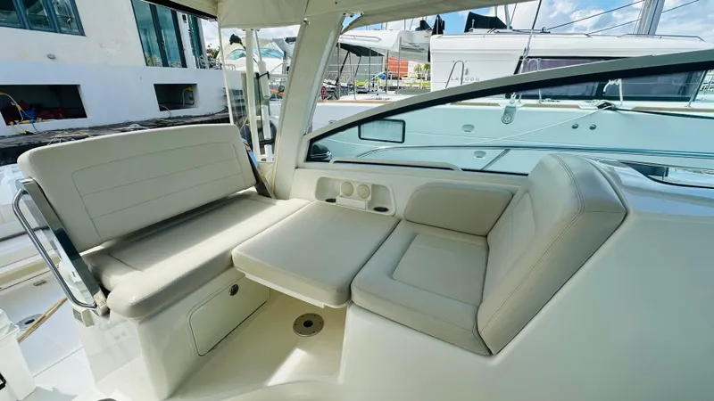 Slide: The Image of Interior of 2018 Boston Whaler 345 Conquest with modern seating and entertainment system. - 8