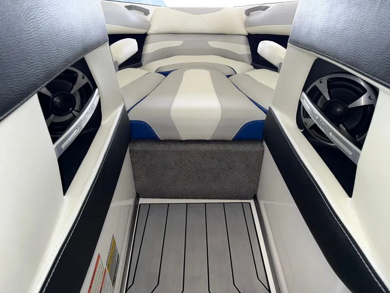 Slide: The Image of 2017 Malibu Wakesetter 23 LSV interior with stylish seating and built-in speakers. - 18