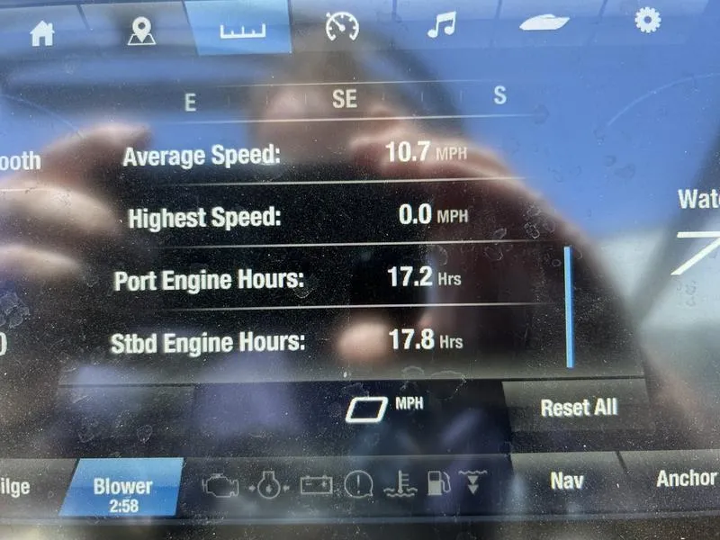 Slide: The Image of Yamaha Boats 2022 212XE dashboard displaying speed and engine hours data. - 1