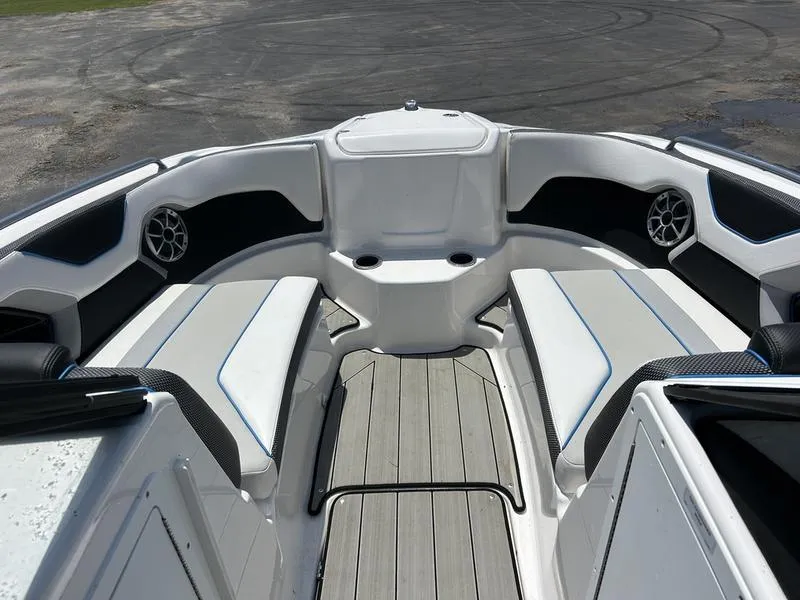 Slide: The Image of 2022 Yamaha Boats 212XE interior with sleek seating and modern design. - 3
