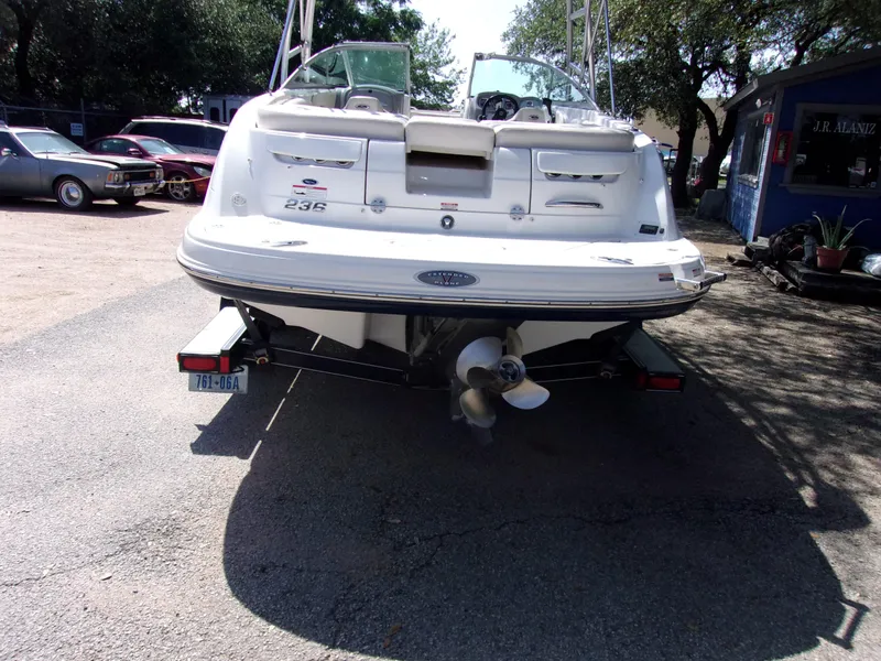 Slide: The Image of 2009 Chaparral 226 SSi boat on trailer, rear view, parked outdoors. - 3