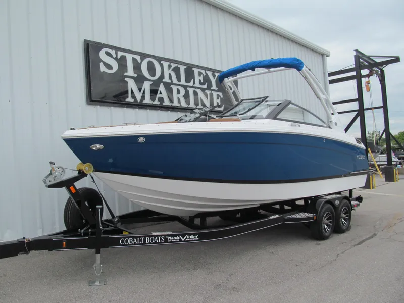 Slide: The Image of 2025 Cobalt R6 boat on trailer at Stokley Marine dealership. - 2