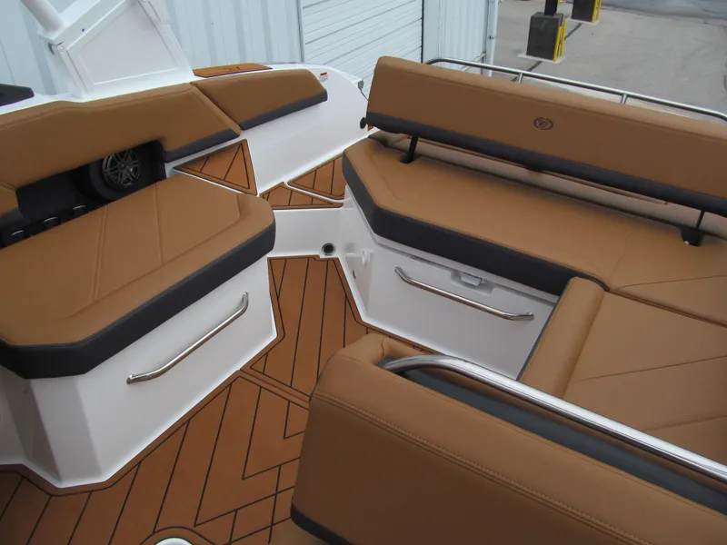 Slide: The Image of Luxurious seating on 2025 Cobalt R6 boat with brown upholstery and sleek design. - 21