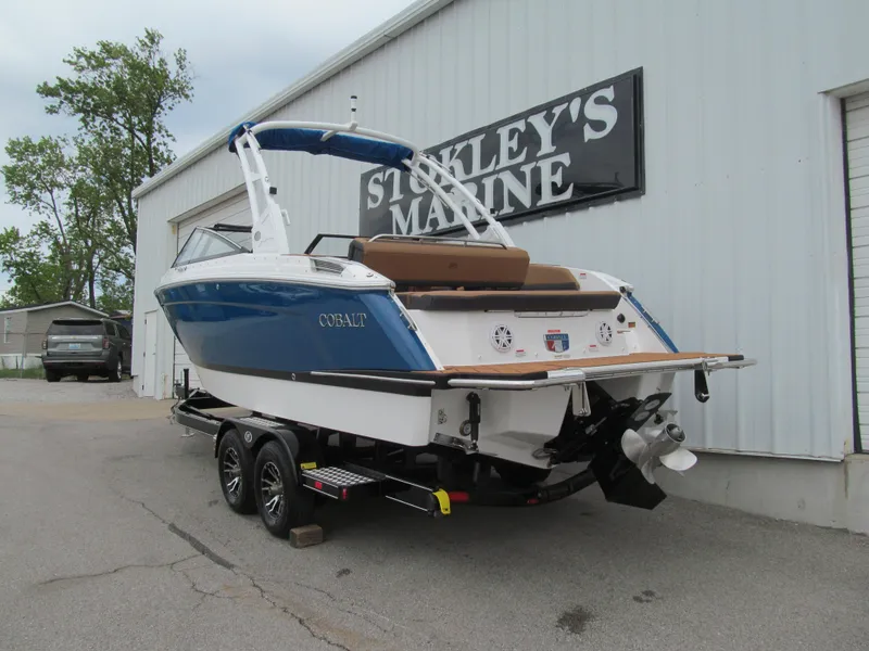 Slide: The Image of 2025 Cobalt R6 boat on trailer at Stokley's Marine dealership. - 4