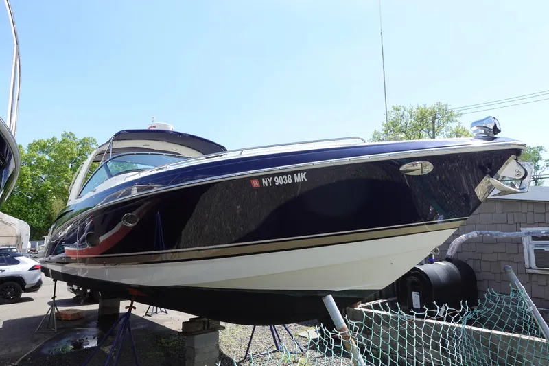 Slide: The Image of 2015 Formula 350 Crossover Bowrider boat on display, side view. - 0