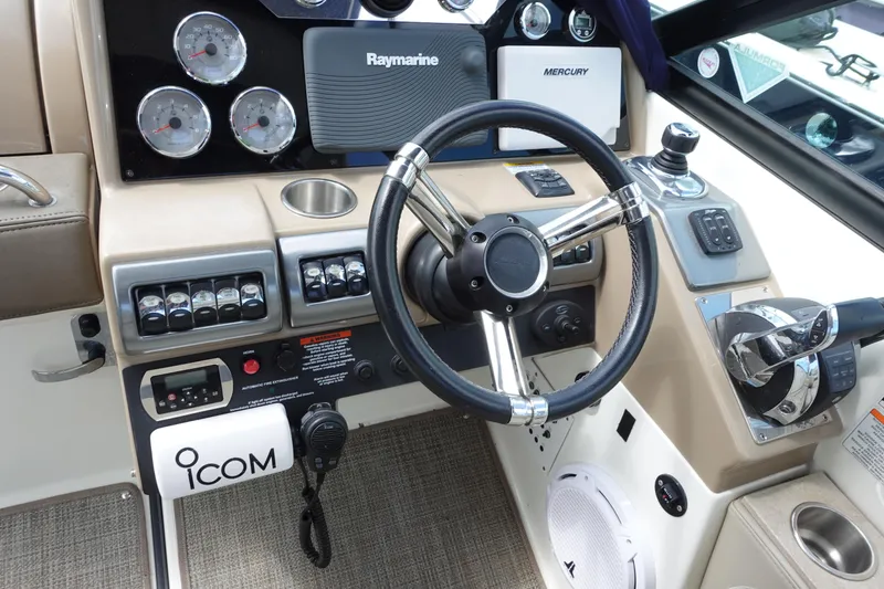 Slide: The Image of 2015 Formula 350 Crossover Bowrider dashboard with steering wheel and control panel. - 11