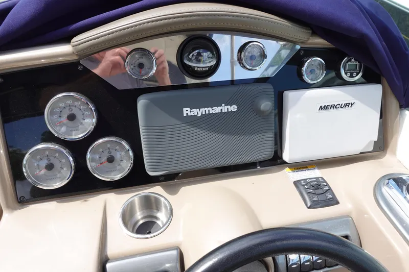 Slide: The Image of Dashboard of 2015 Formula 350 Crossover Bowrider with Raymarine and Mercury equipment. - 12