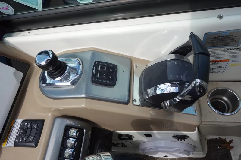 Slide: The Image of 2015 Formula 350 Crossover Bowrider helm controls with joystick and throttle. - 14