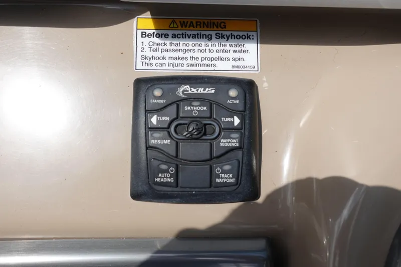 Slide: The Image of Control panel with warning label on 2015 Formula 350 Crossover Bowrider boat. - 15