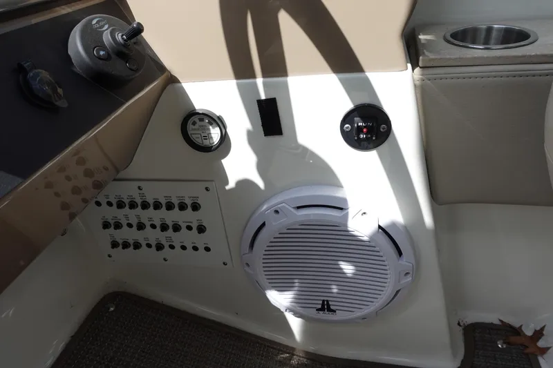 Slide: The Image of Control panel and speaker on 2015 Formula 350 Crossover Bowrider boat. - 17