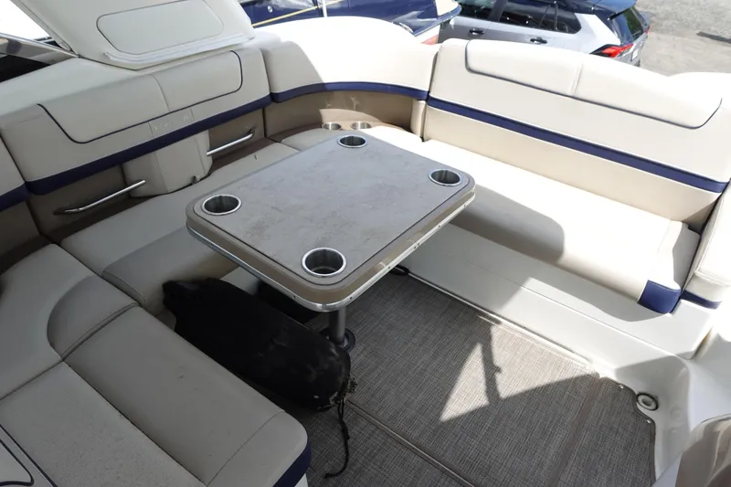 Slide: The Image of 2015 Formula 350 Crossover Bowrider interior with seating and table. - 19