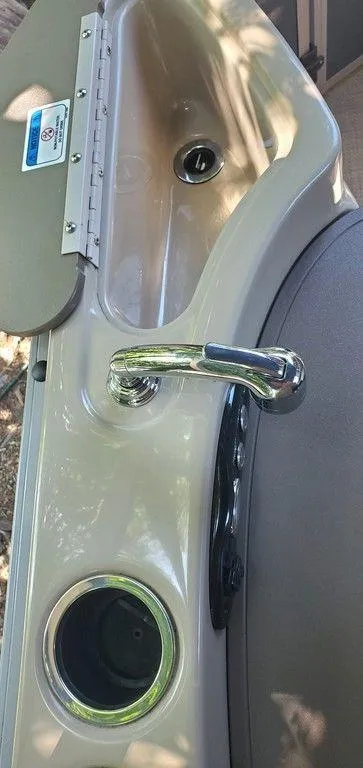 Slide: The Image of 2017 Regency 220 DL3 boat sink and faucet with cup holder. - 10